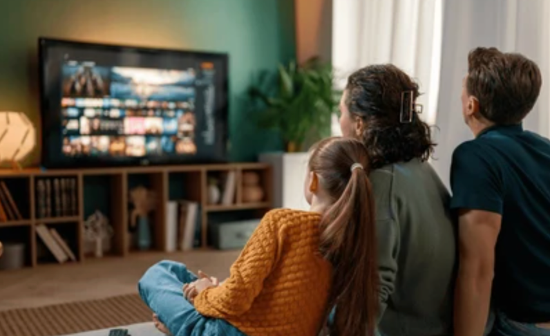 Family Watching Apollo Tv Group
